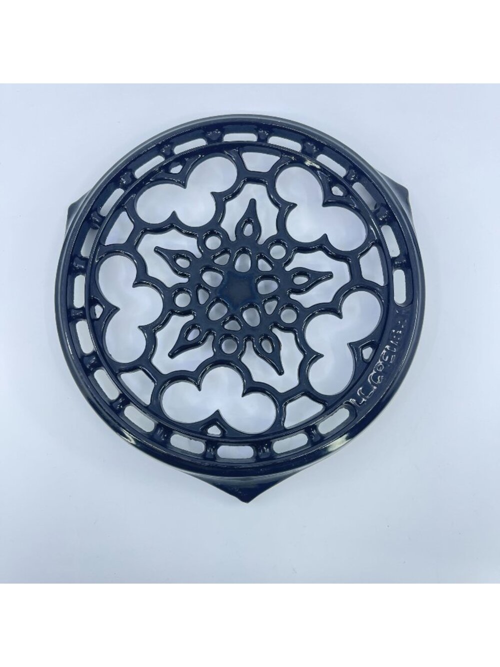 vintage le creuset cast iron trivet intricate ornate openwork pattern black